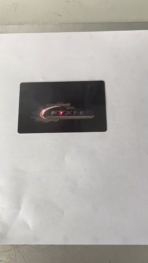 Recorded logo marking on a dark sample plate; exact material and power are not specified